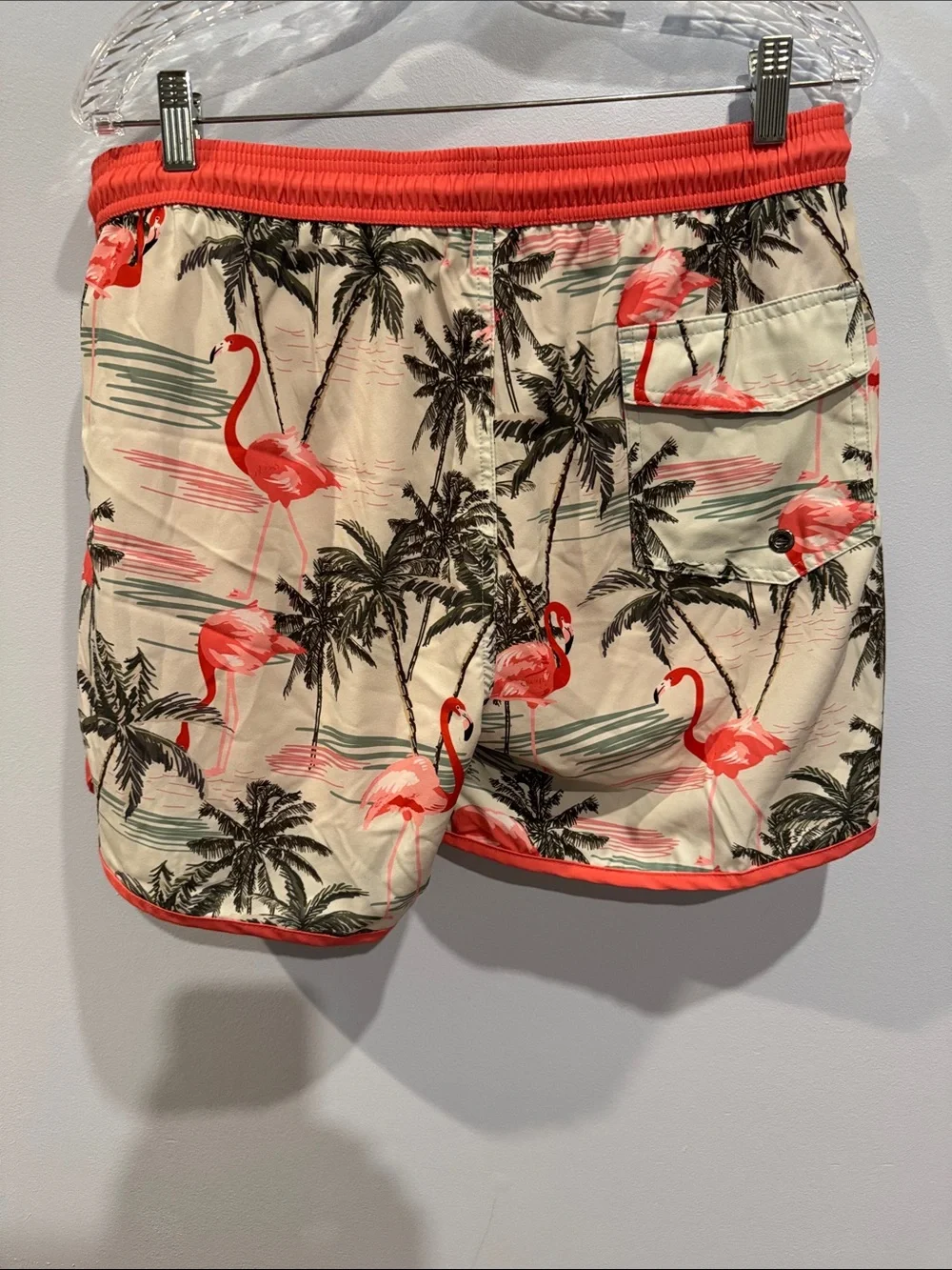 Maamgic flamingo print swim trunks feature a vintage 80s-90s style with a contra